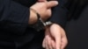 GERMANY -- Stephan Balliet, who is accused of shooting dead two people after an attempt to storm a synagogue in Halle an der Saale, eastern Germany, has his hands cuffed as he arrives into the courtroom 