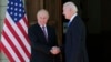 Russian President Vladimir Putin (left) shakes hands with U.S. President Joe Biden and smiles for the cameras at the start of their June 16, 2021 summit in Geneva, Switzerland.