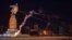 Activists dismantle Ukraine's biggest monument to Vladimir Lenin in the central square of the eastern city of Kharkiv in September 2014.