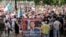 Demonstrators in Khabarovsk, Russia on July 25, 2020 carry a poster that calls for the return of former Governor Sergei Furgal, dubbed "The People's Governor." 