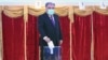Tajik President Emomali Rakhmon, a presidential candidate for the fifth time, casts his ballot at a polling station in Dushanbe during Tajikistan's presidential election on October 11, 2020, amid the ongoing coronavirus disease pandemic.