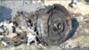 One of the engines of Ukraine International Airlines flight 752, a Boeing 737-800 plane that crashed after taking off from Tehran's Imam Khomeini airport on January 8, 2020, is seen in this still image taken from Iran Press footage.   