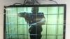 Aleksei Navalny appears via video link during a court hearing in Moscow on June 25.
