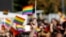 KOSOVO -- A participant vawe rainbow flags during Kosovo's first-ever LGBT pride parade held in Pristina, October 10, 2017