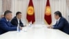 President Sooronbai Jeenbekov (right) meets with Kyrgyzstan's new parliamentary speaker, Kanat Isaev (front left), and prime minister, Sadyr Japarov, in Bishkek on  October 14, 2020.