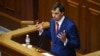 Ukraine's MP Oleksiy Honcharuk speaks during the first session of the country's new parliament on August 29.