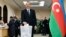 Azerbaijani President Ilham Aliyev casts his ballot at a Baku polling station during Azerbaijan's February 9, 2020 parliamentary elections.
