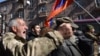 Opposition supporters march through the streets of Yerevan on February 26, 2021 to demand Prime Minister Nikol Pashinian's resignation over his handling of the 2020 war with Azerbaijan.